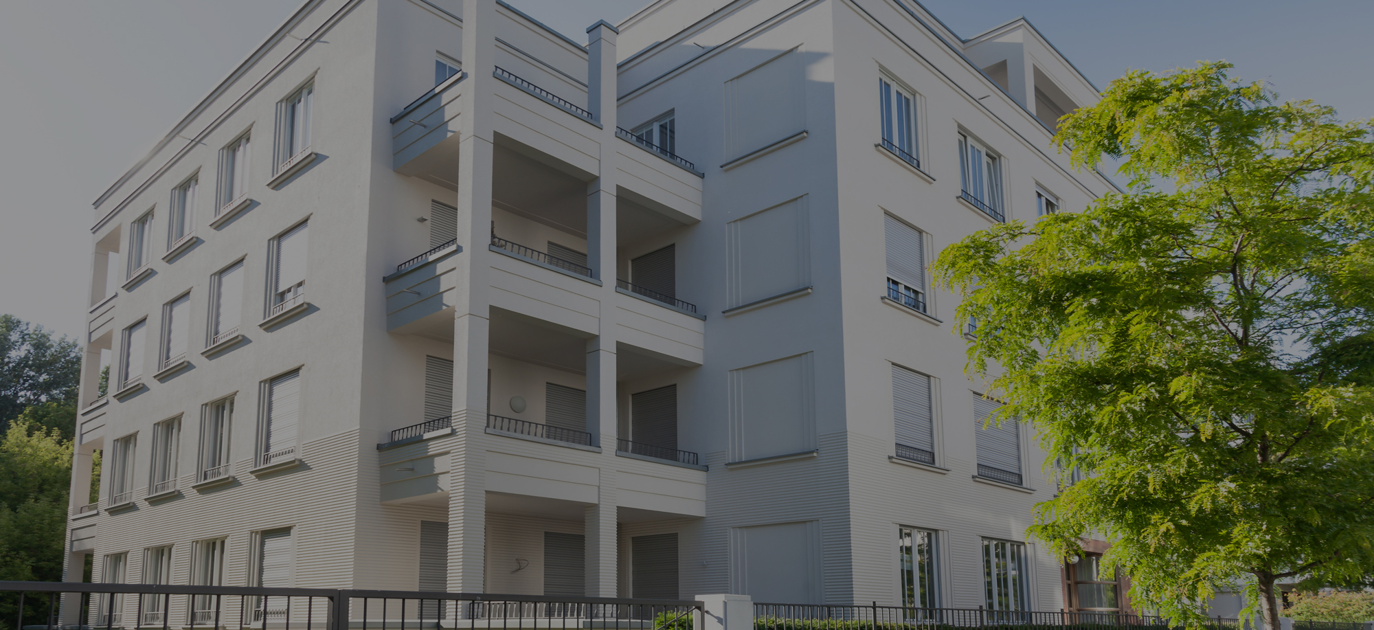 White apartment building Kimball Tirey & St. John LLP